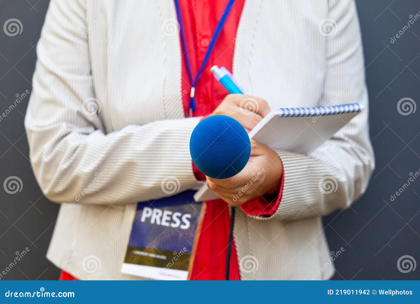 female journalist or reporter at news conference or media event. journalism concept.