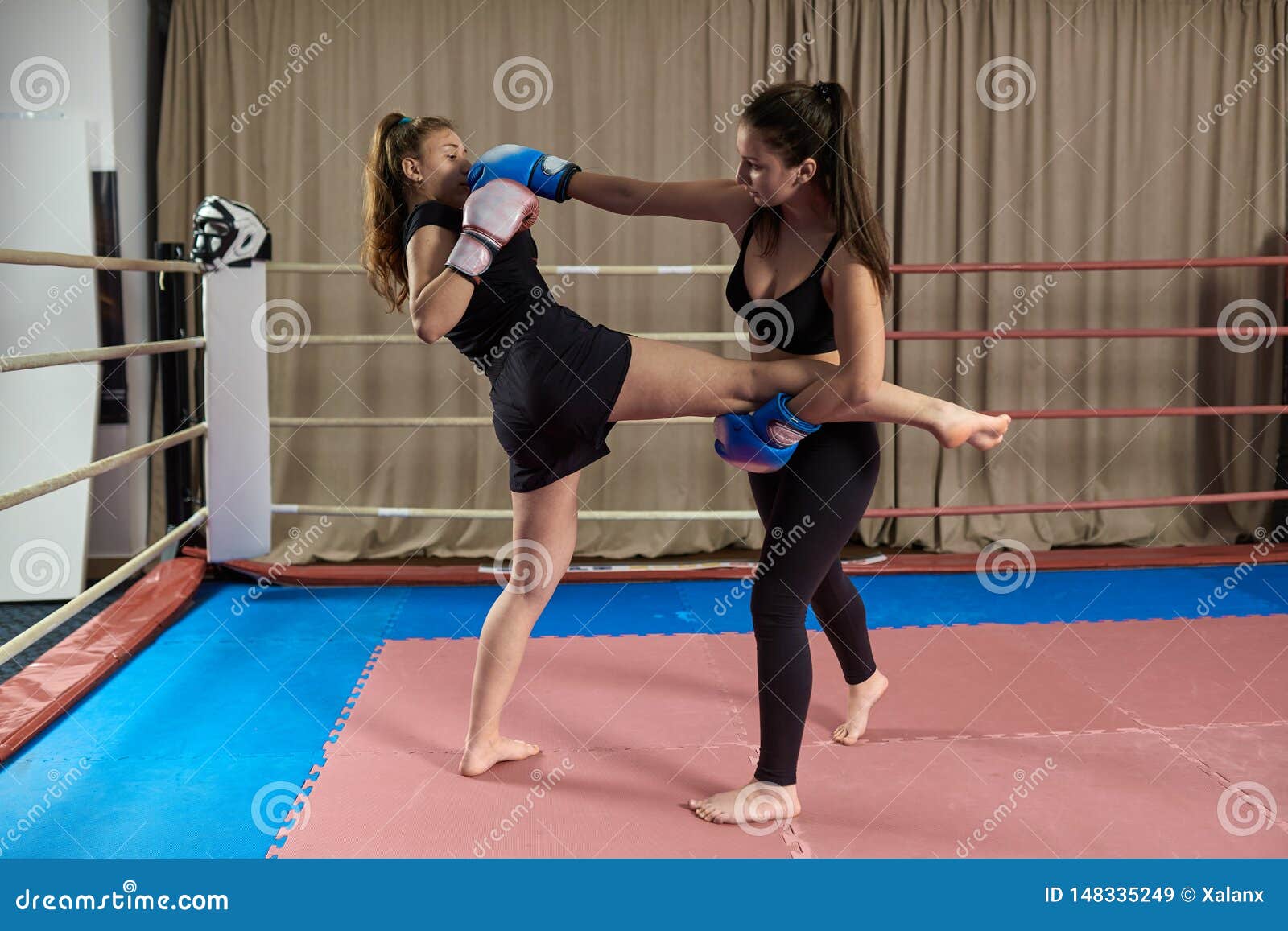 Kickboxing girls sparring stock image. Image of kick 148335249