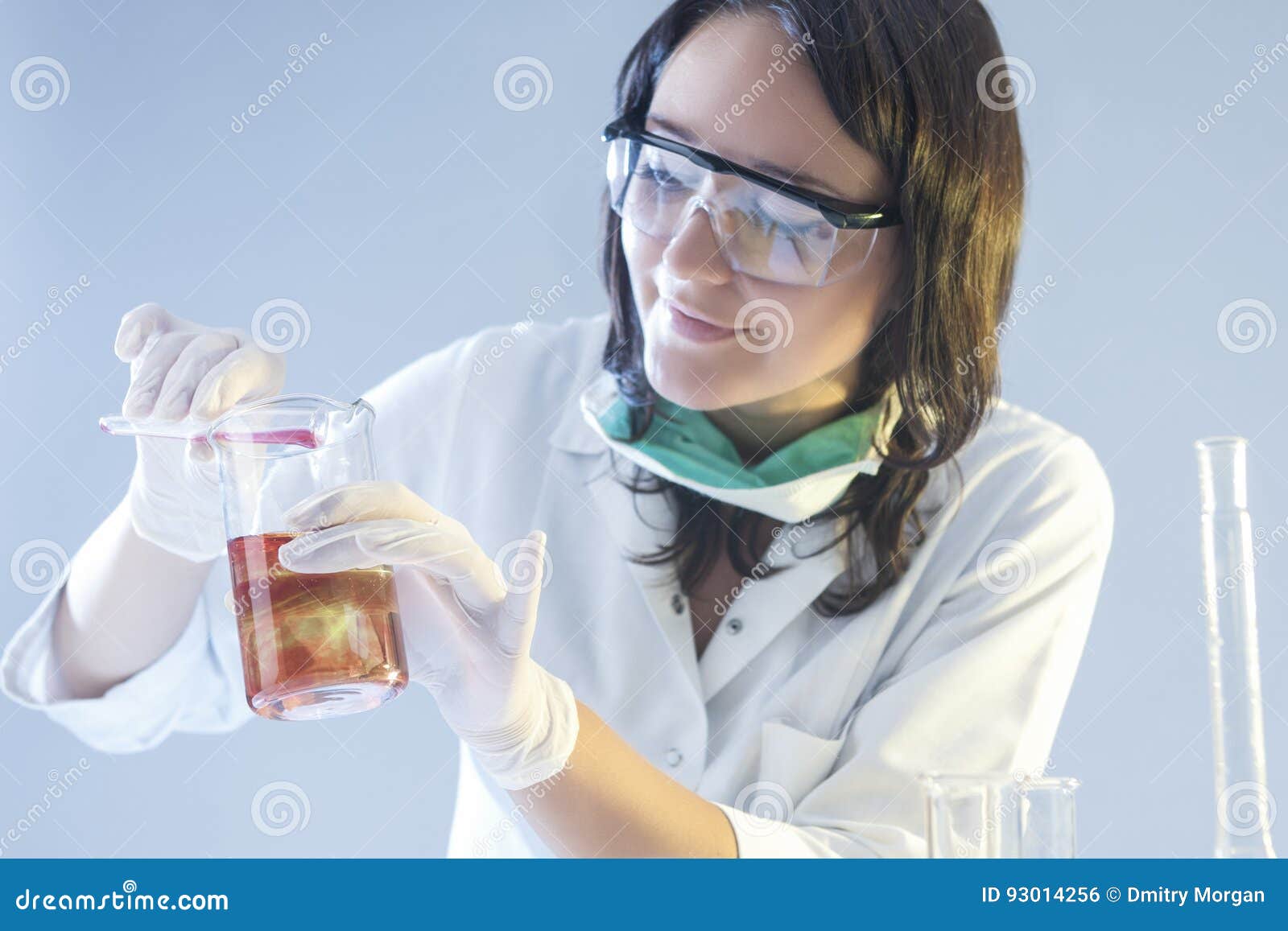 Female Laboratory Assistant in Protective Gloves during Scientific
