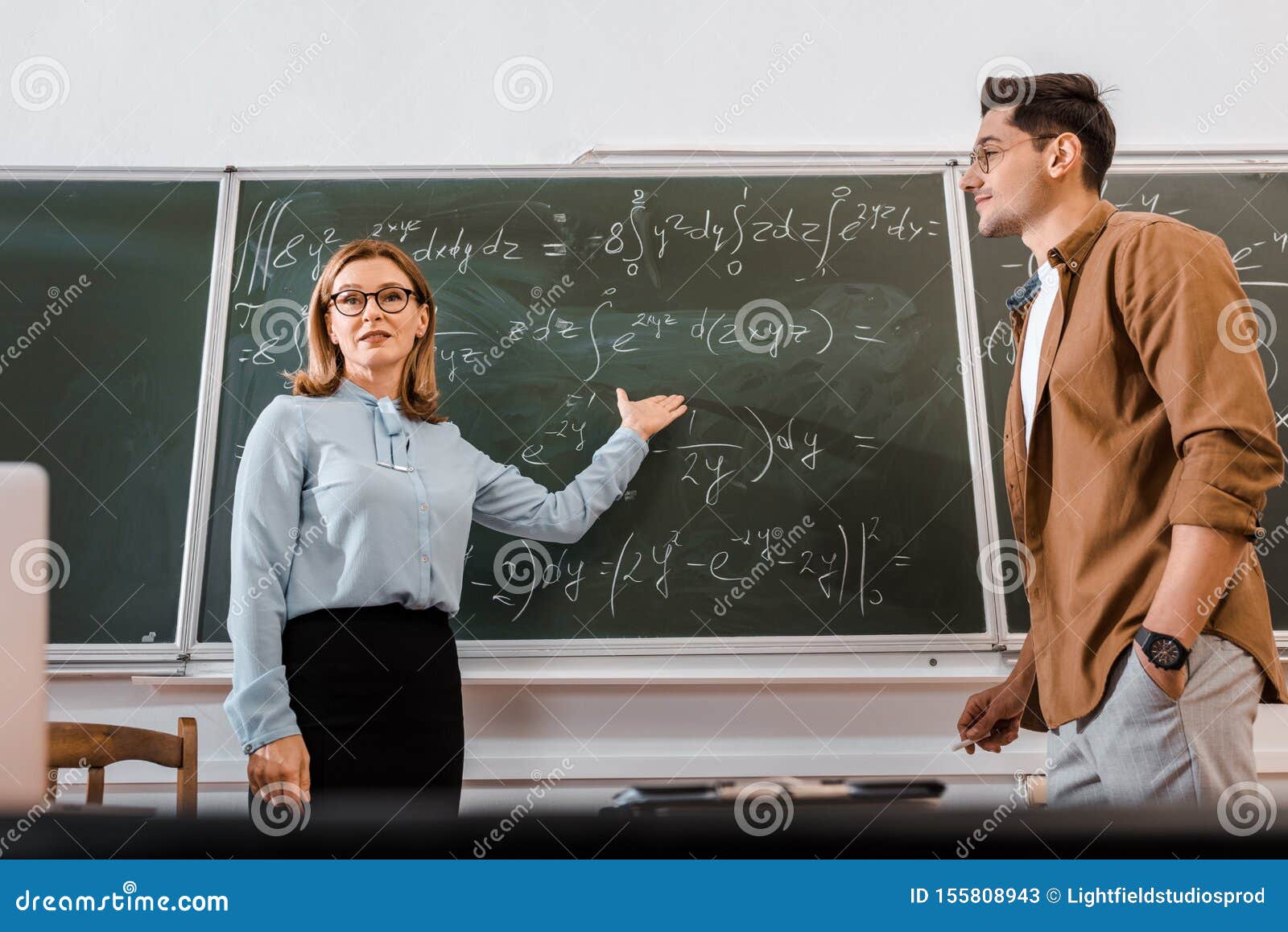 Female Lecturer Standing in Glasses and Stock Image Image of Female Lecturer Standing in Glasses and Stock Image Image of