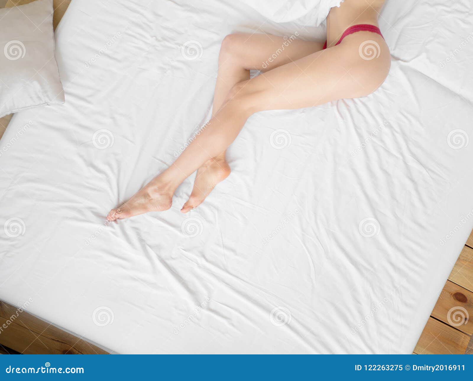 Female Legs on the Bed Covered with Sheets Stock Image Image of care, interior 122263275
