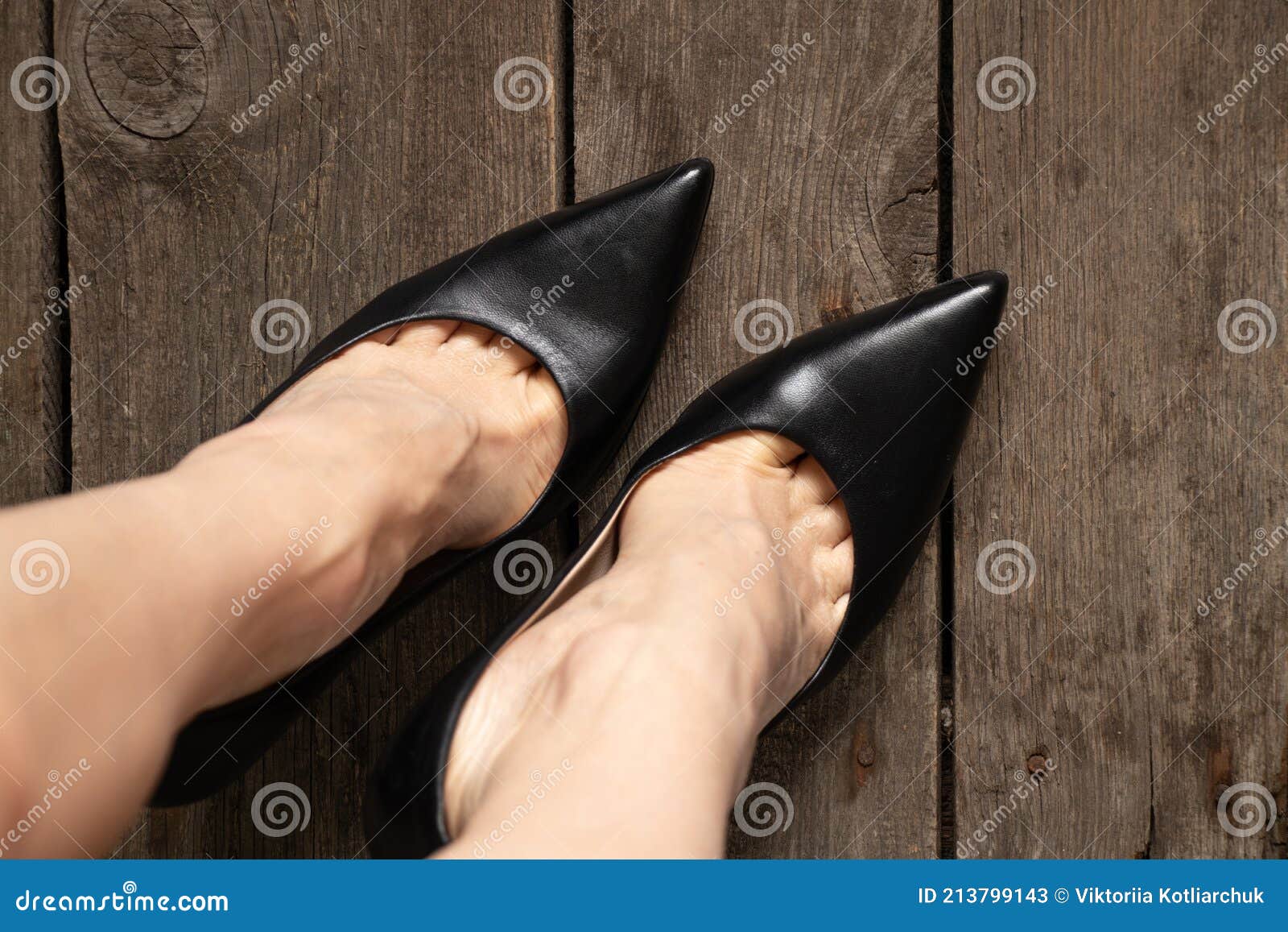 Female Legs in Black Leather High Heel Shoes on Old Wooden Floor and ...