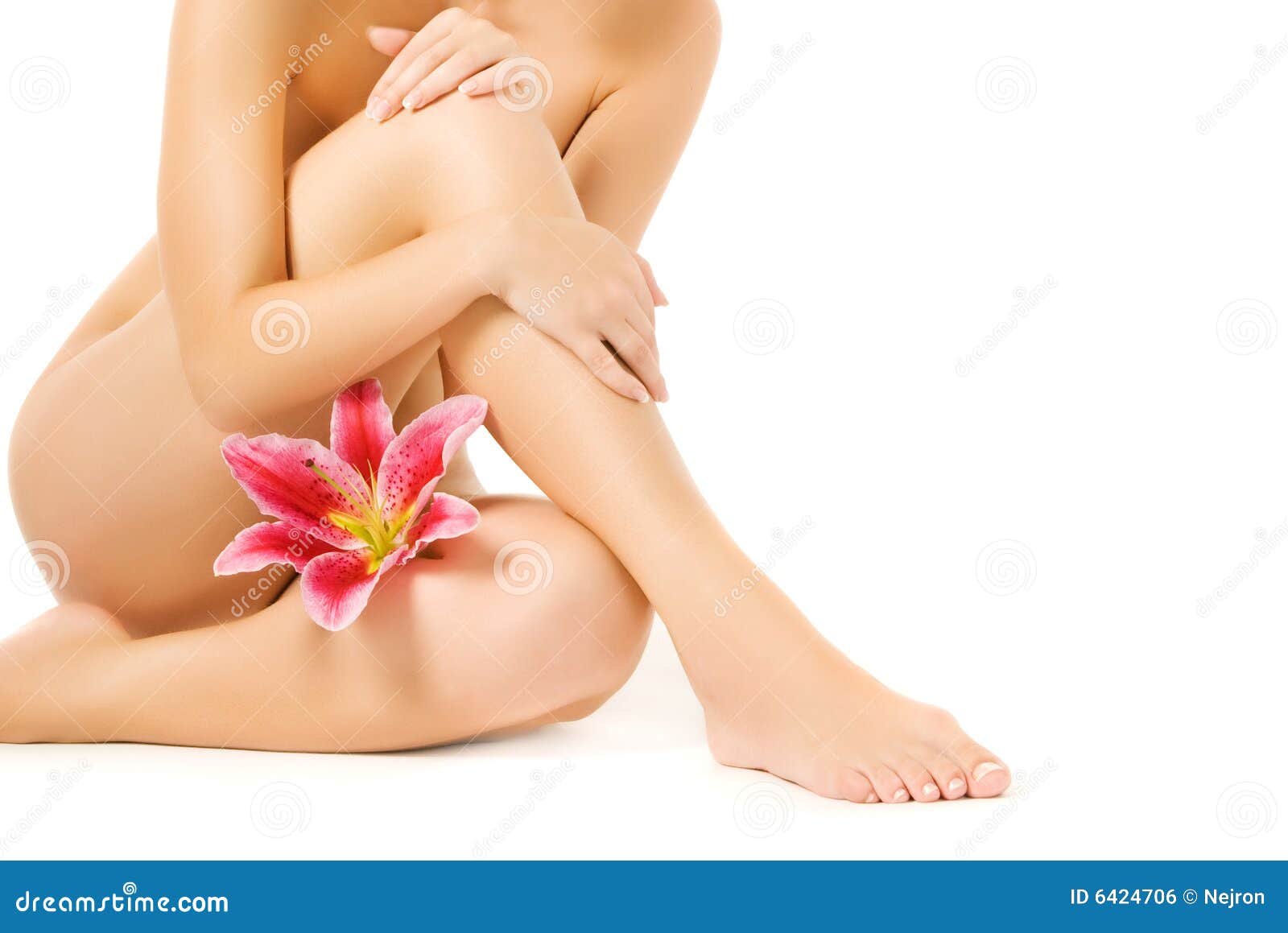 female legs with pink lily