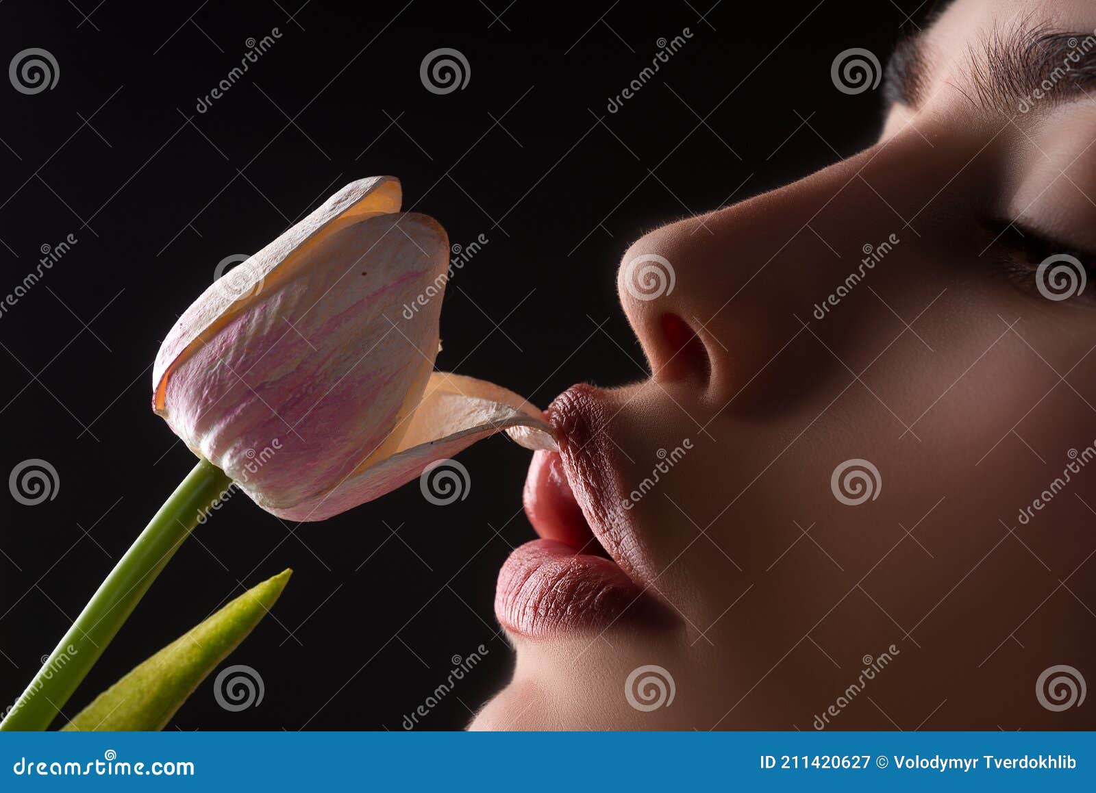 Female Lips and Spring Flower