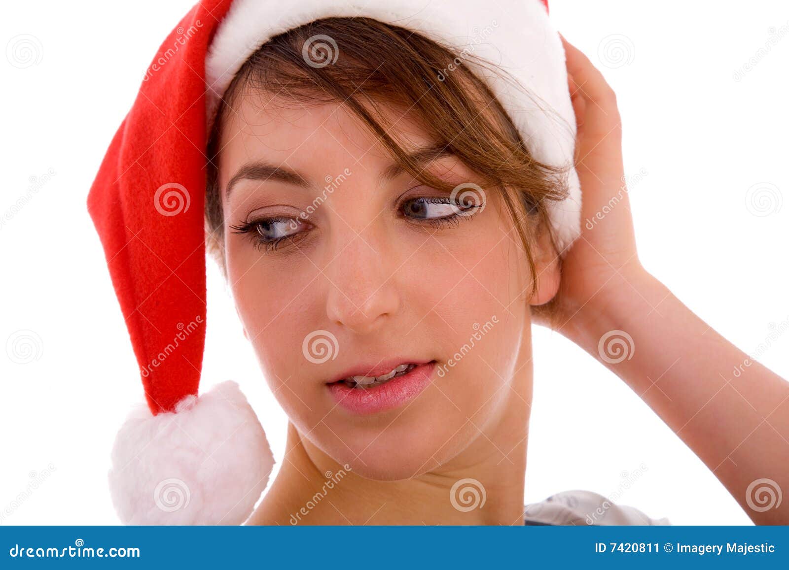 Female Looking Sideways Wearing Christmas Hat Stock Image Image of