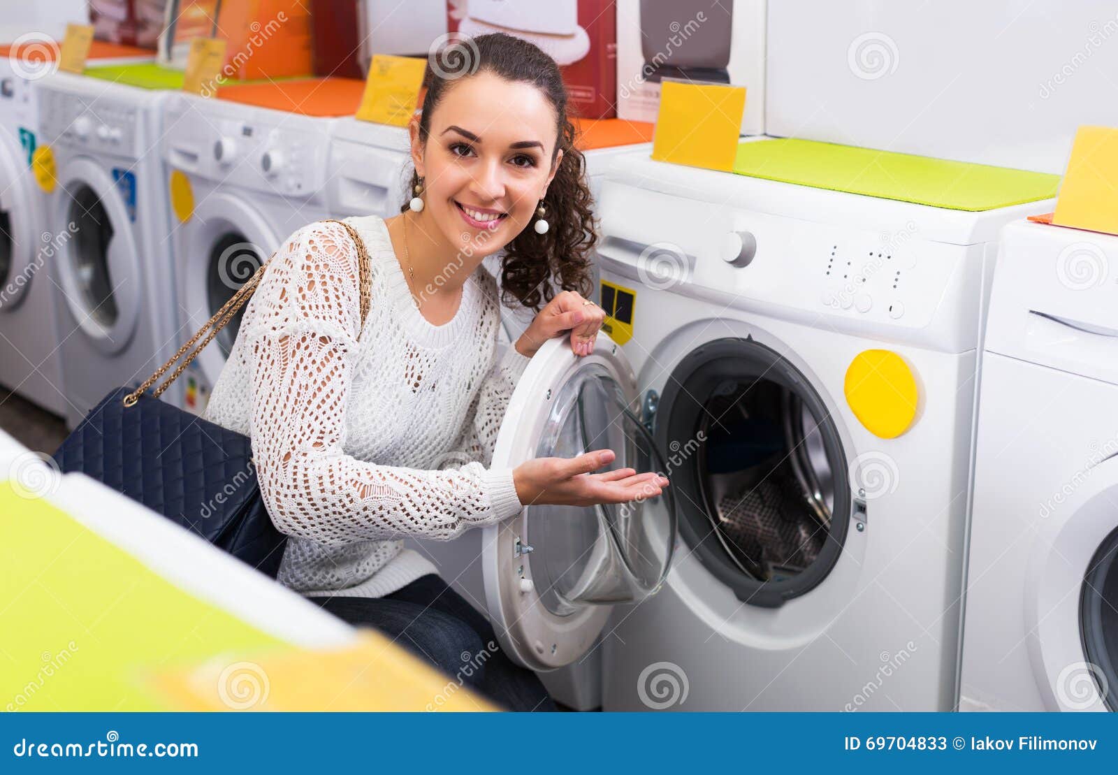 Female looking at washers stock image. Image of dryer - 69704833