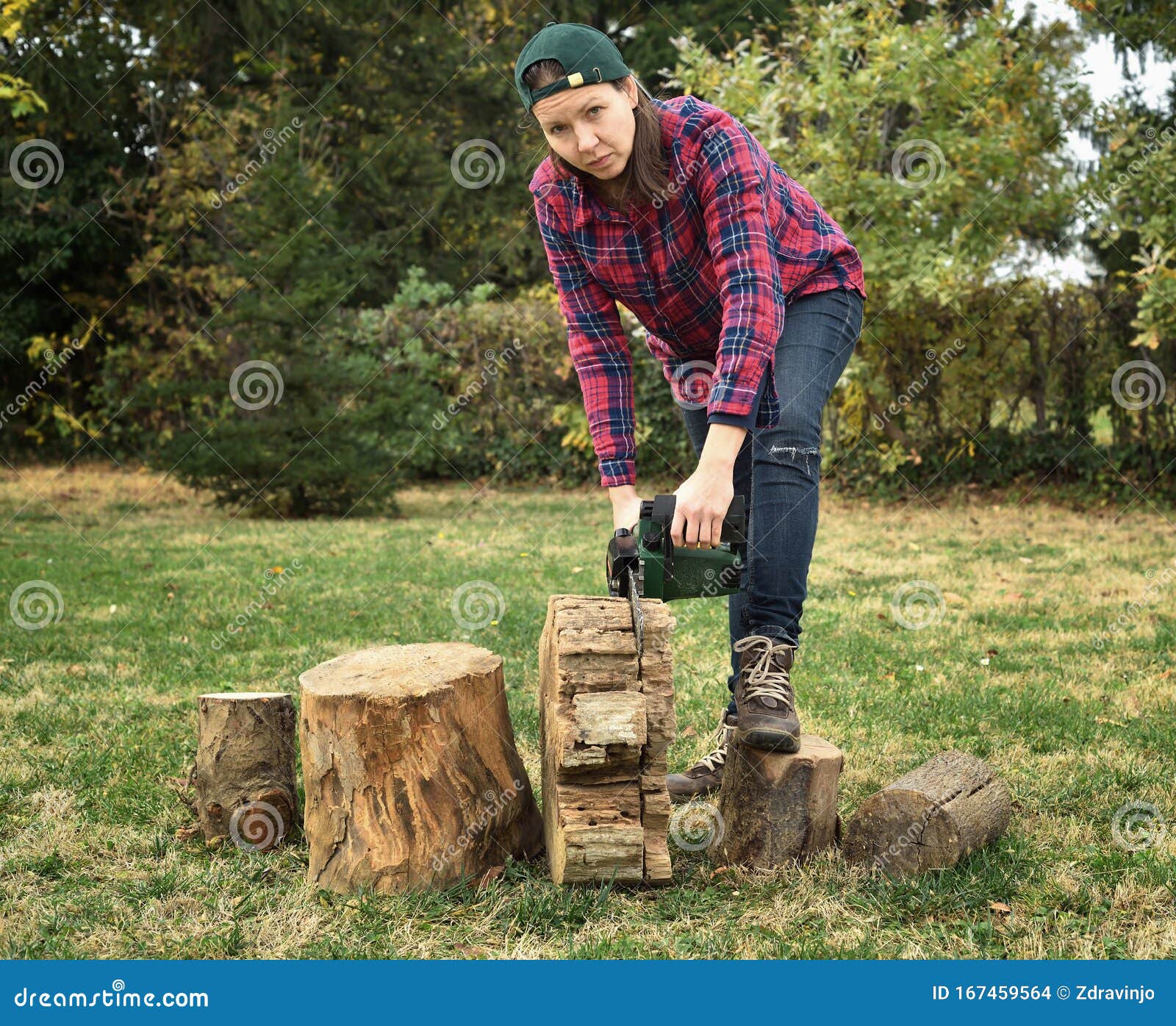 Female Lumberjack Holding a Chainsaw Stock Photo Image of occupation
