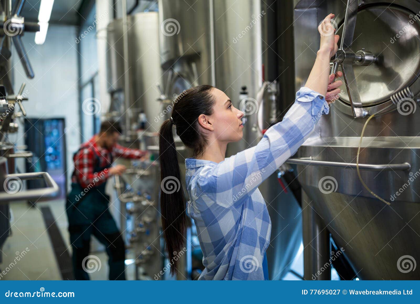 Female Maintenance Worker Examining Brewery Machine Stock Image Image