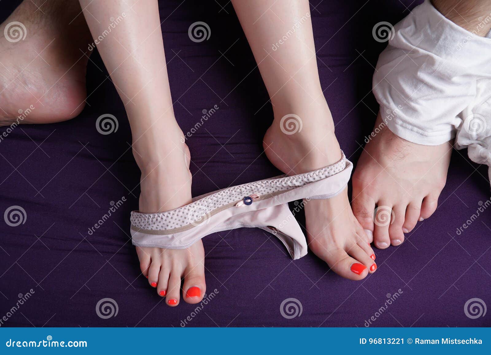 Female and Male Feet Lie on a Violet Sheet. on Feet Deflated Underwear  Stock Image - Image of game, pink: 96813221