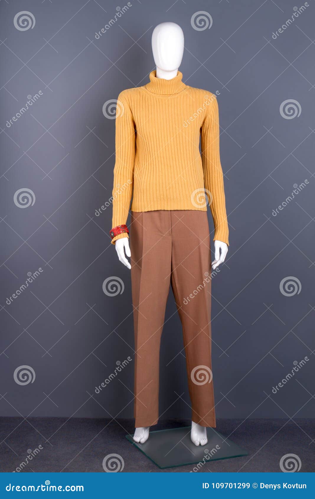 Female Mannequin in Yellow Turtleneck Sweater. Stock Image - Image of ...