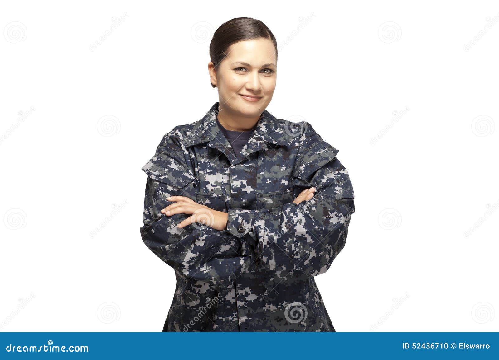 female in navy uniform with arms crossed