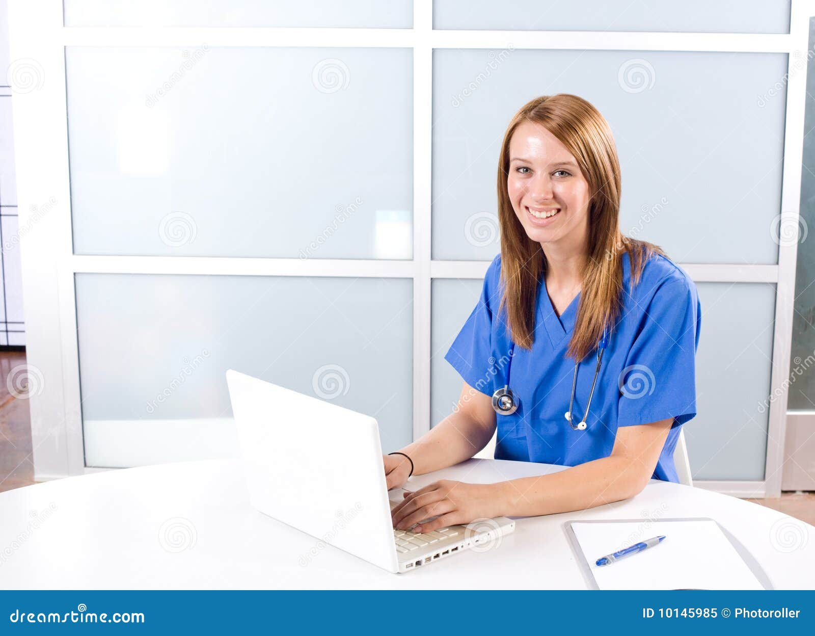 Female Nurse at a Desk Working Stock Image Image of hospital