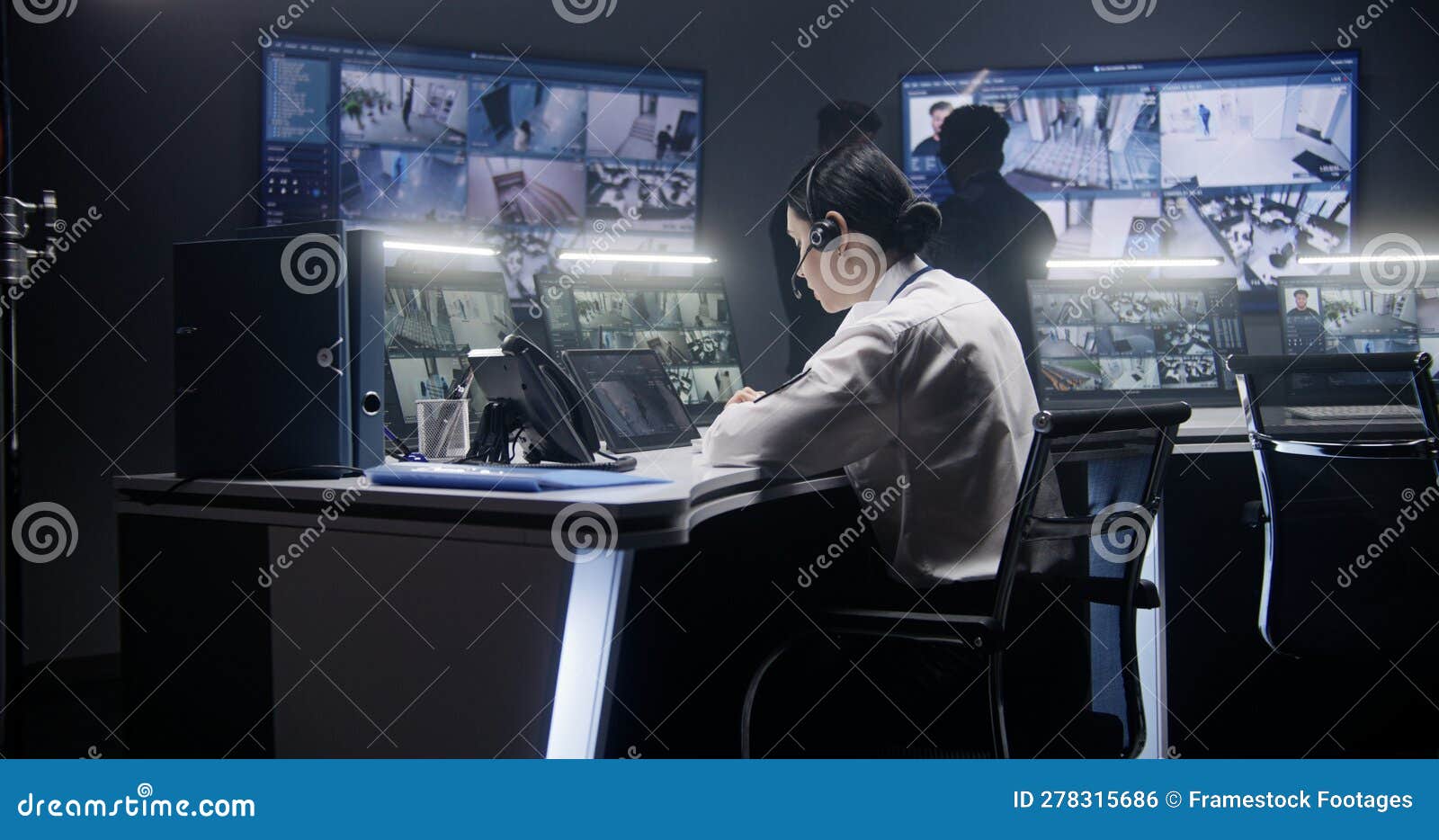 Female Officer Controls CCTV Cameras Using Tablet Stock Photo Image