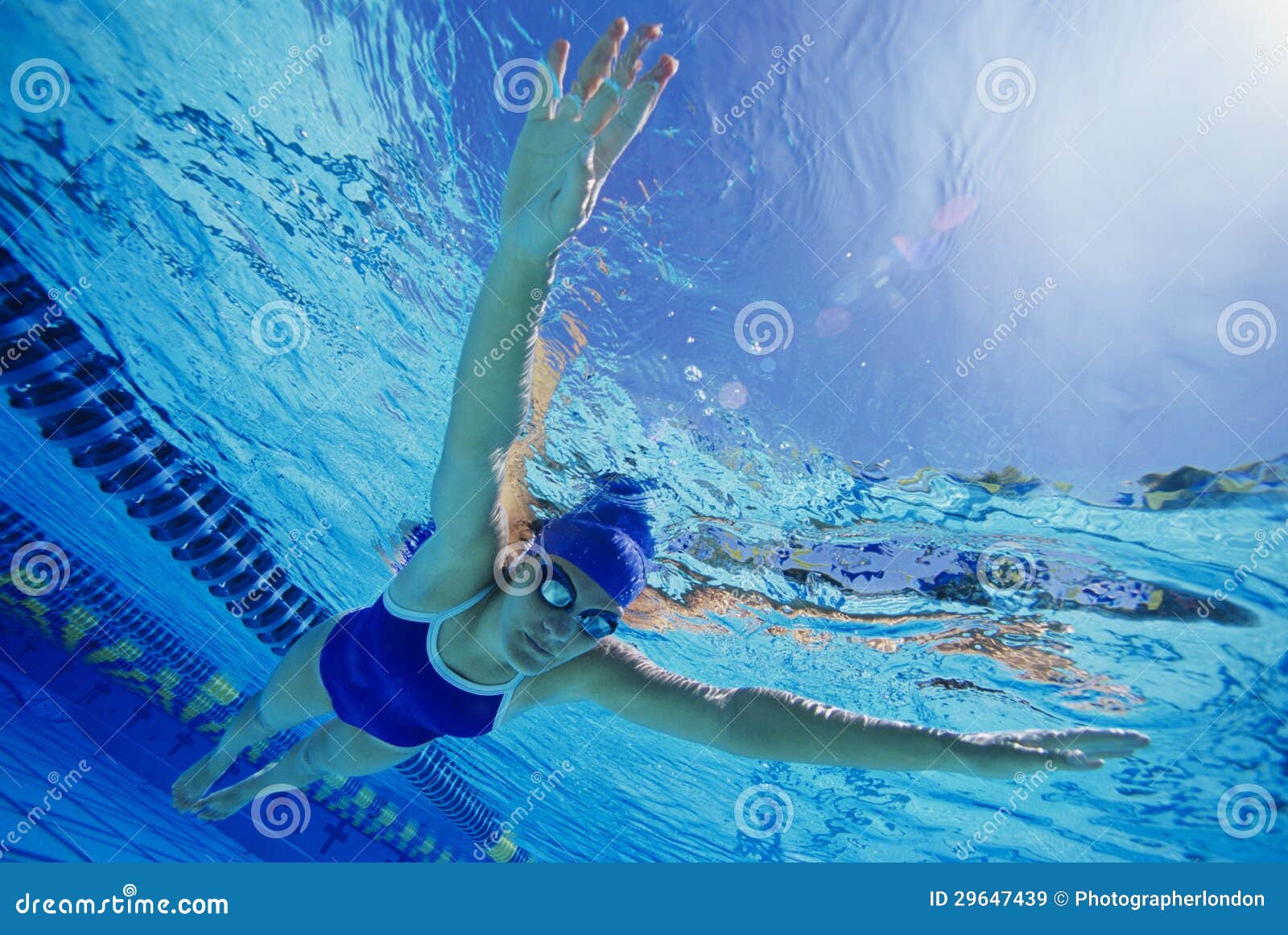 female participant swimming underwater