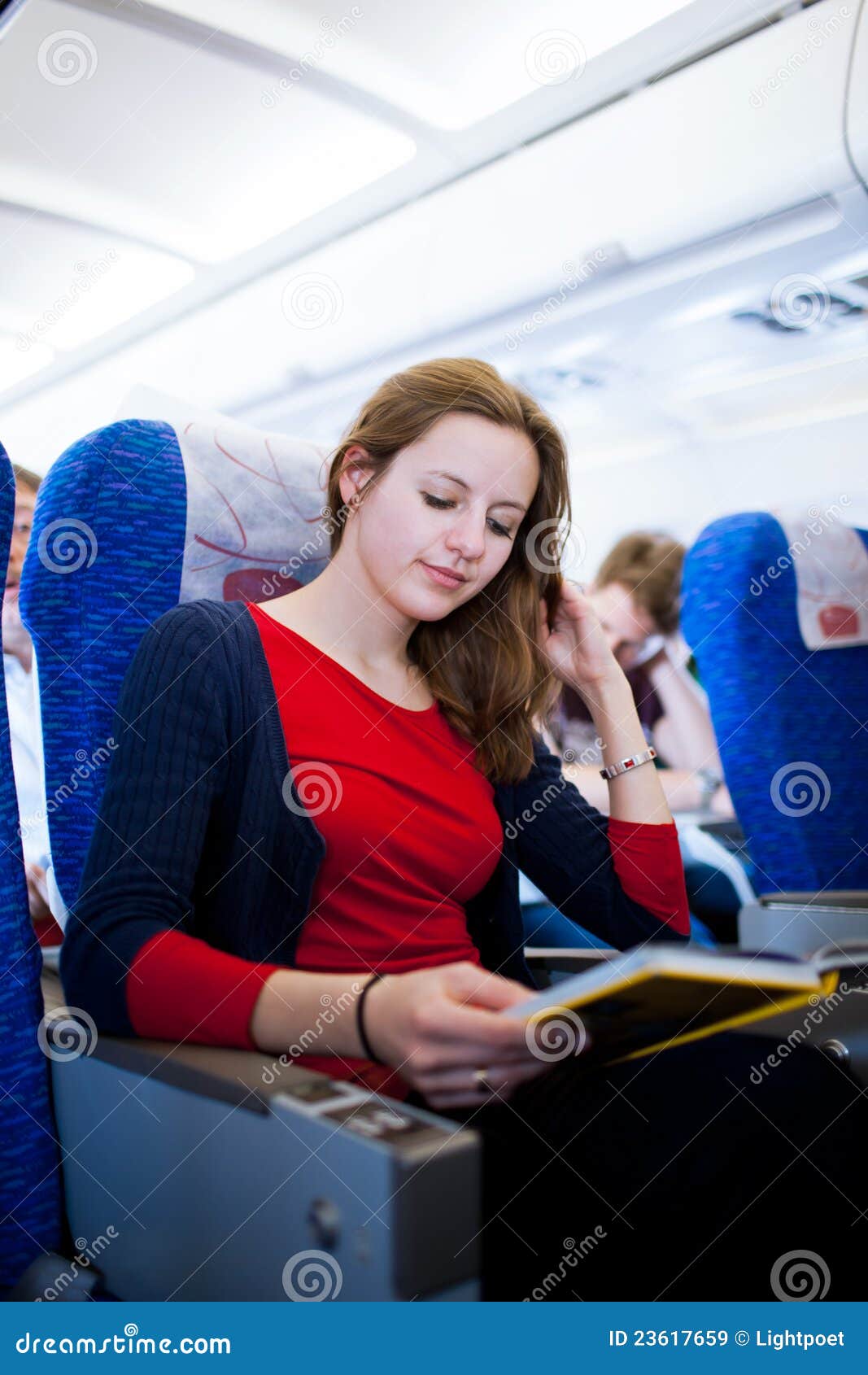 Female Passenger On Board Of An Aircraft Stock Image