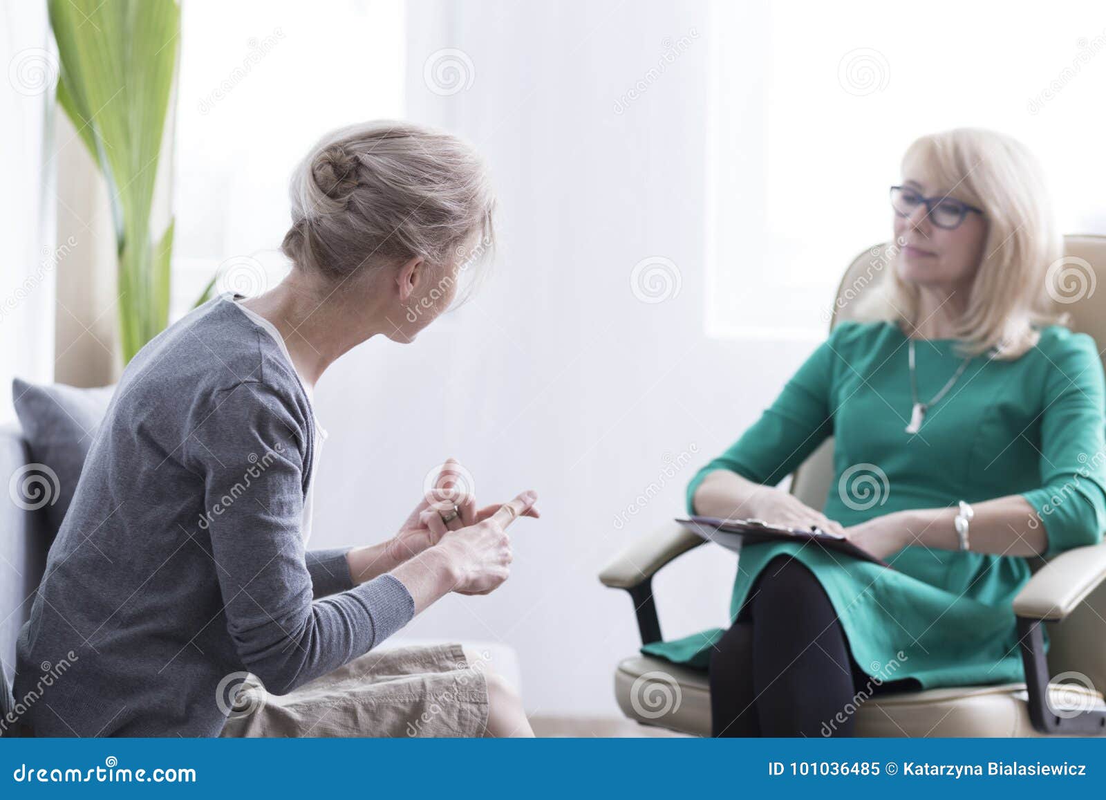 female patient talking with therapist