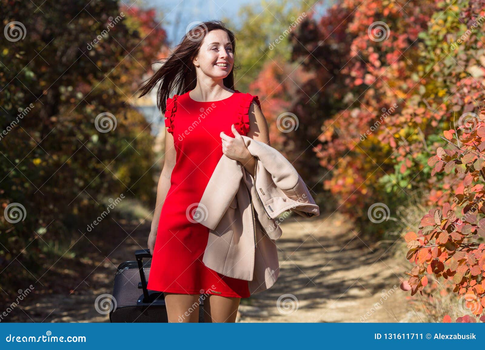 Female Person in Red Dress Walking Under Autumn Trees Stock Image ...