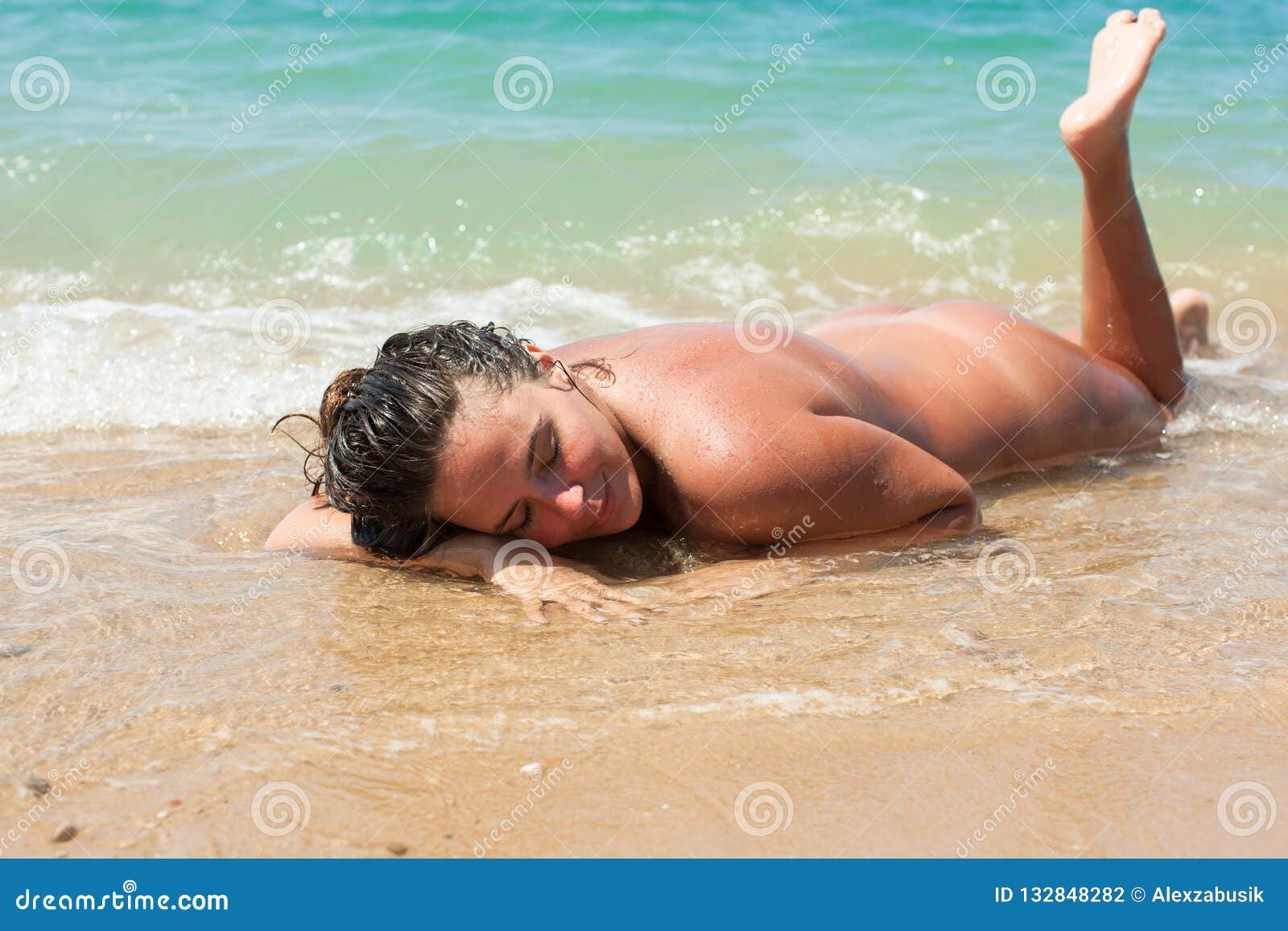 Nude Girl Sun Tanning On Beach