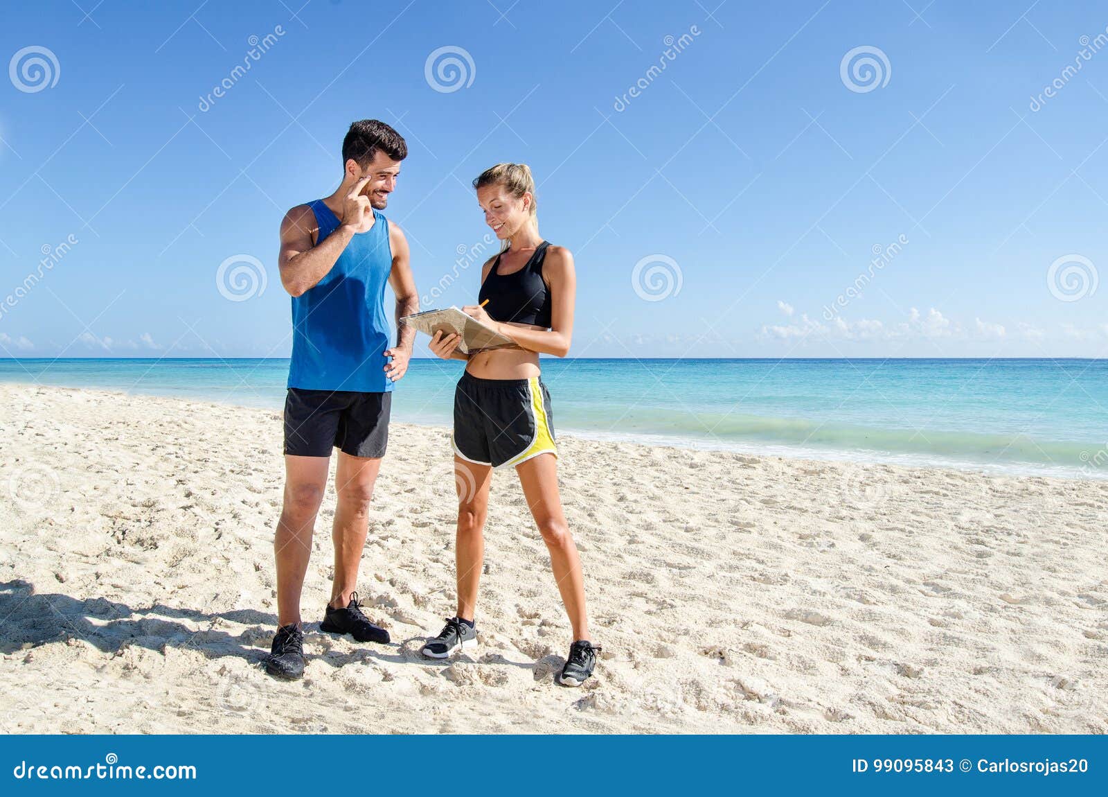 Dog Trainer At Beach RoyaltyFree Stock Image 47137480