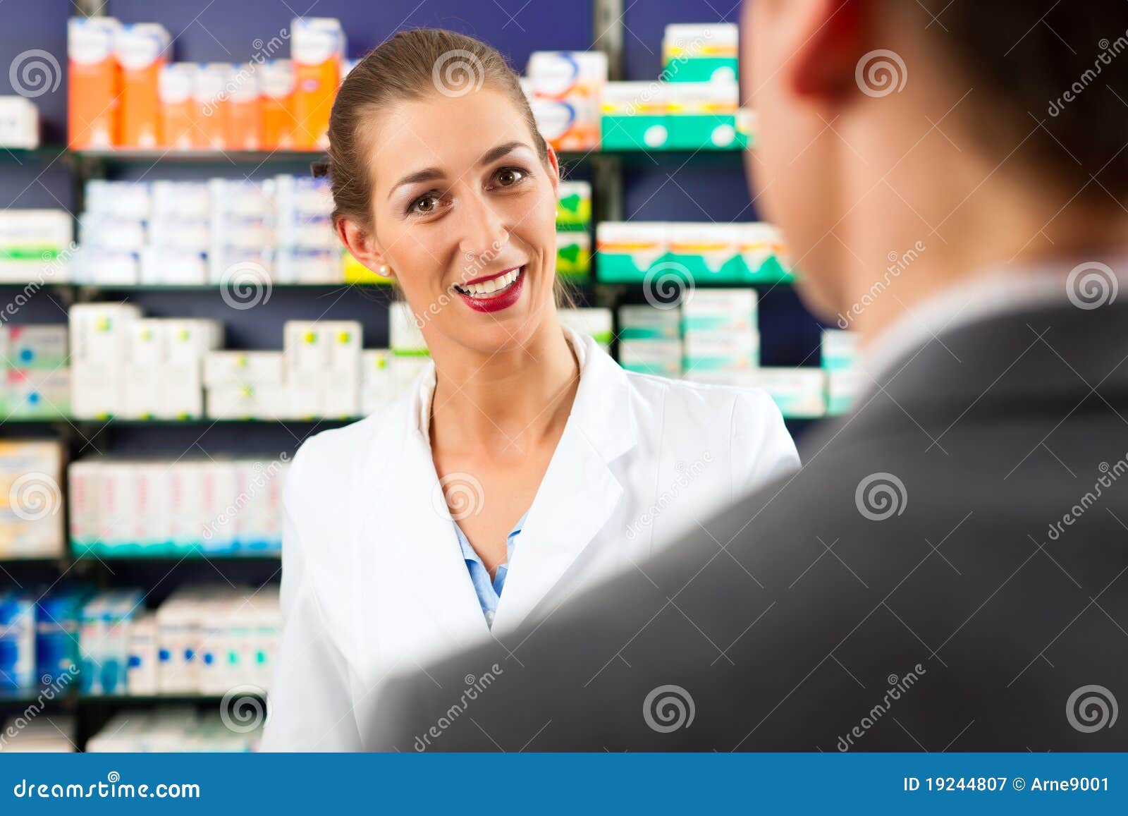 Female Pharmacist with Client in Pharmacy Stock Image Image of caucasian, profession 19244807