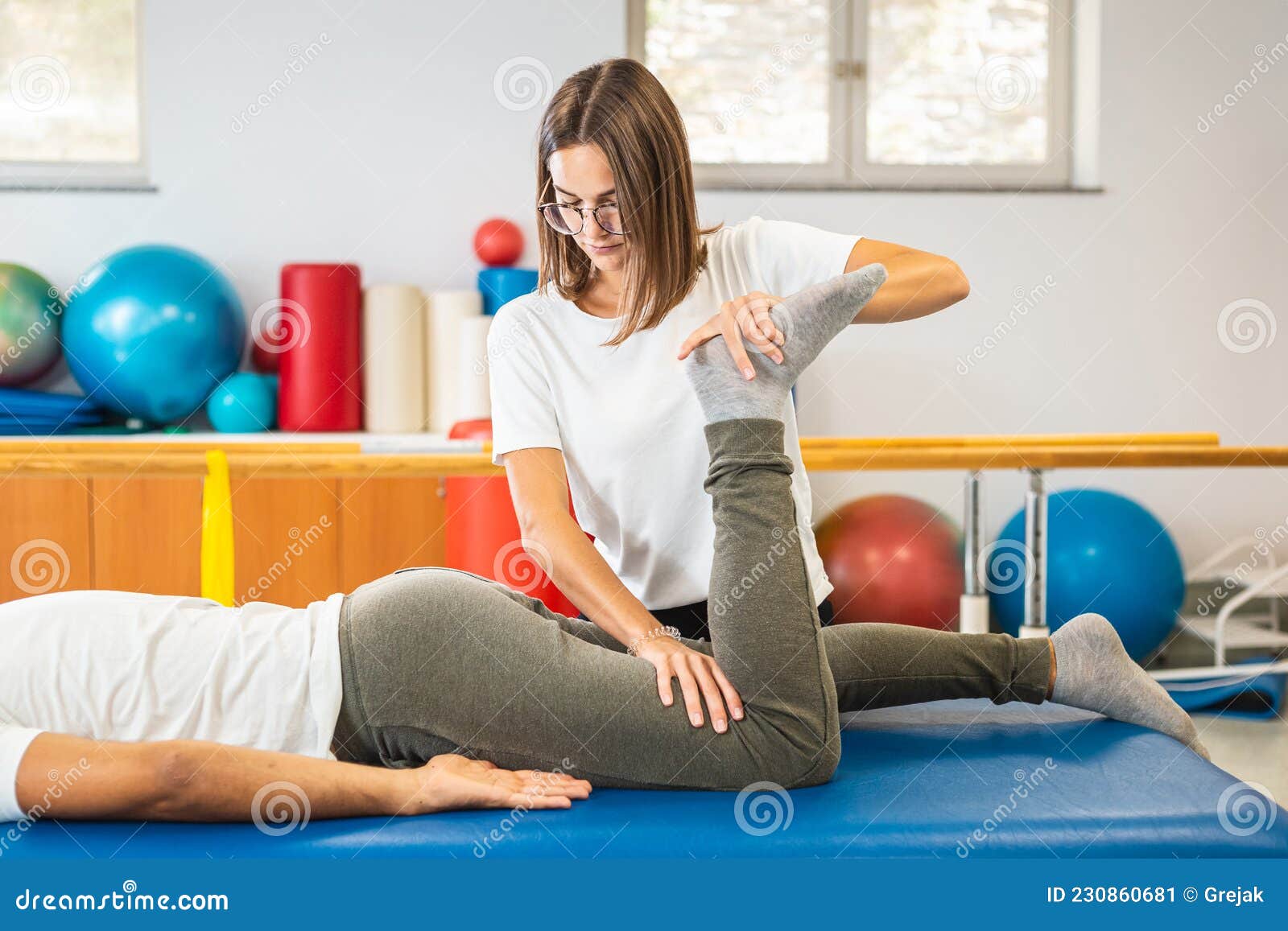 Leg Stretching Exercises in the Supine Position Stock Image - Image of  preventive, physio: 230860681