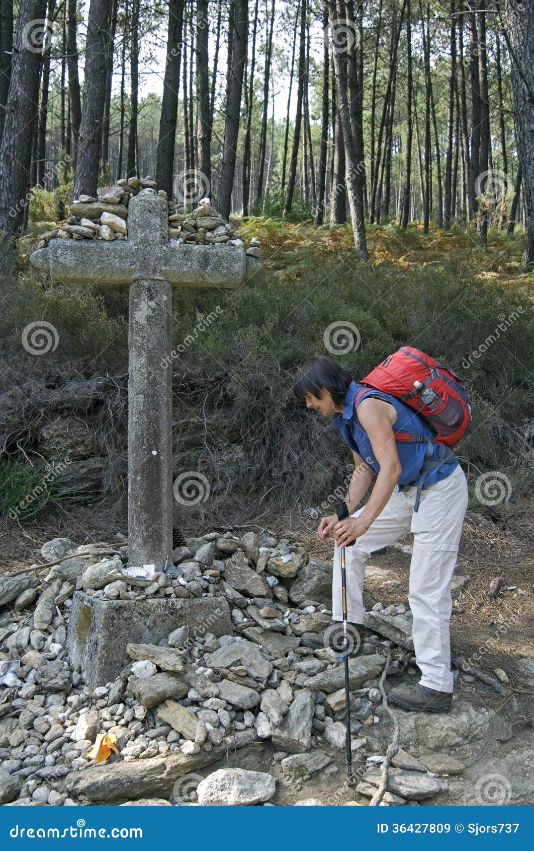 female pilgrim on the way of st. james in portugal