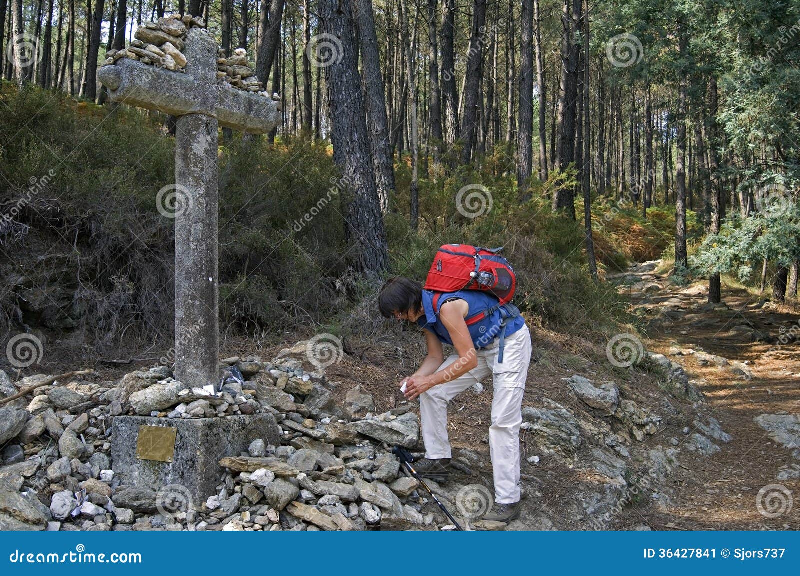 female pilgrim on the way of st. james in portugal