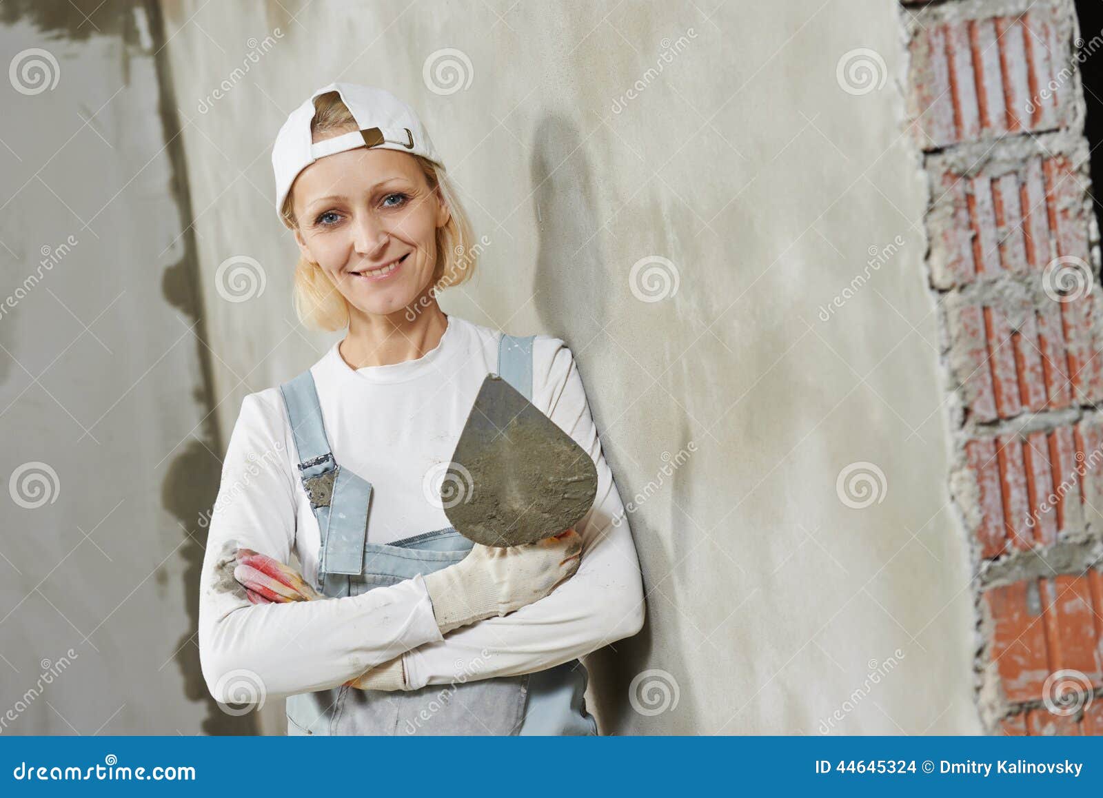 Female plasterer portrait stock photo. Image of plasterer - 44645324