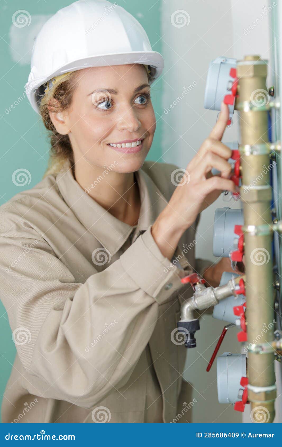 Female Plumber Opens Water Valve at Home Stock Image Image of water