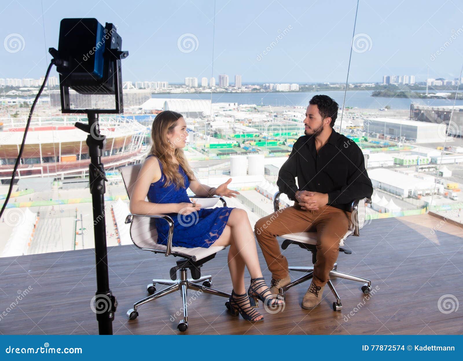 Female Presenter Asking a Famous Celebrity at Tv Studio Stock Photo