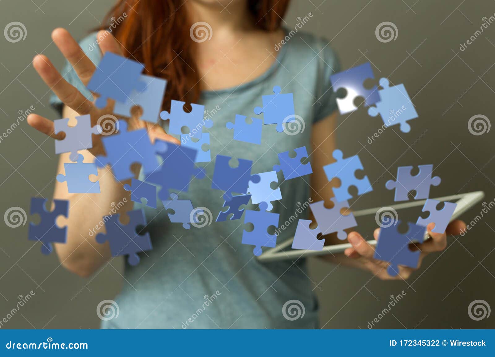 Female Presenting the Digital Projection of Puzzle Pieces Success and