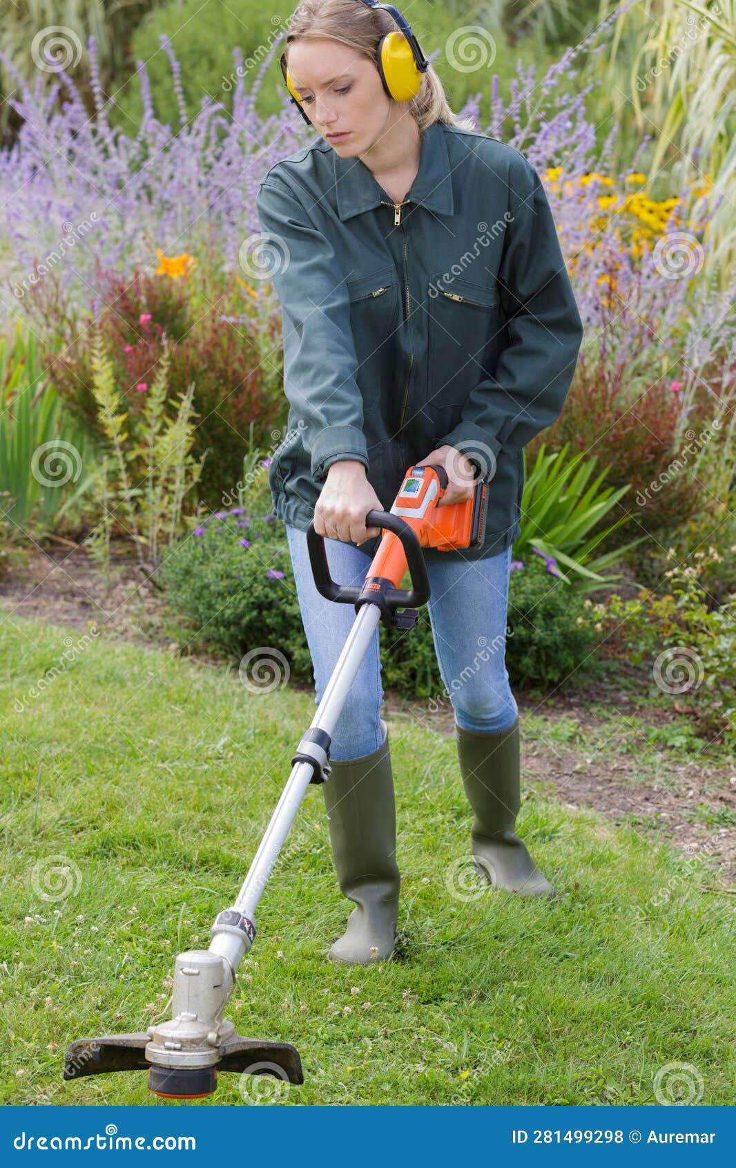Female Professional Gardener Using Strimmer Stock Photo Image of