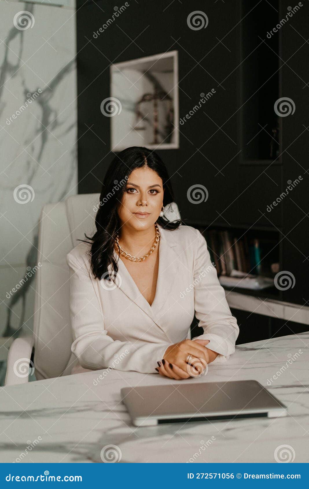 Female Professional at Her Home Office, Smiling with Contentment Stock