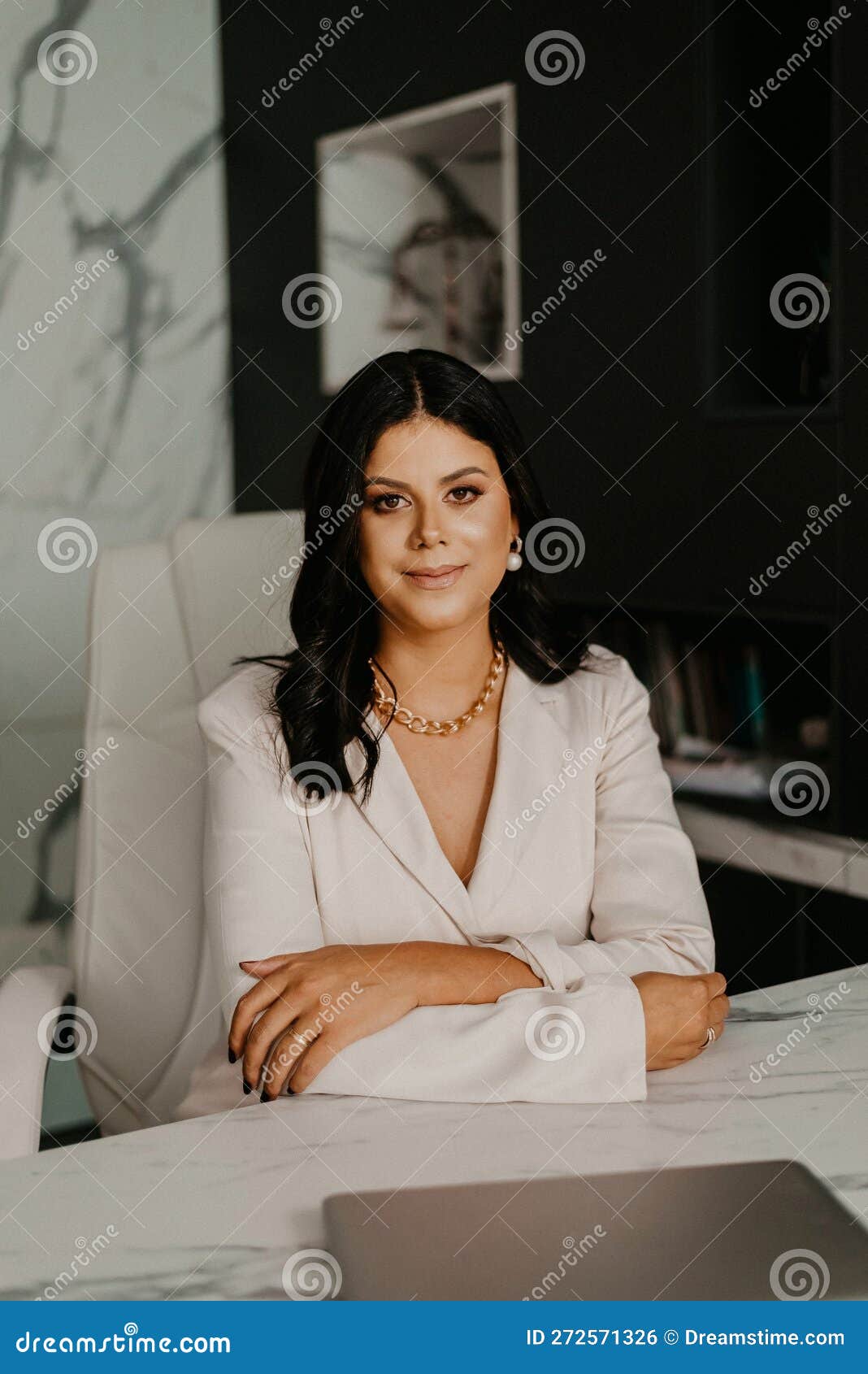 Female Professional at Her Home Office, Smiling with Contentment Stock