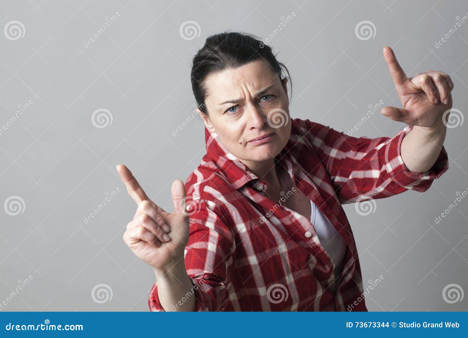 Female Rapper Showing An Aggressive Hand Gesture For Arrogant Attitude Royalty Free Stock Image