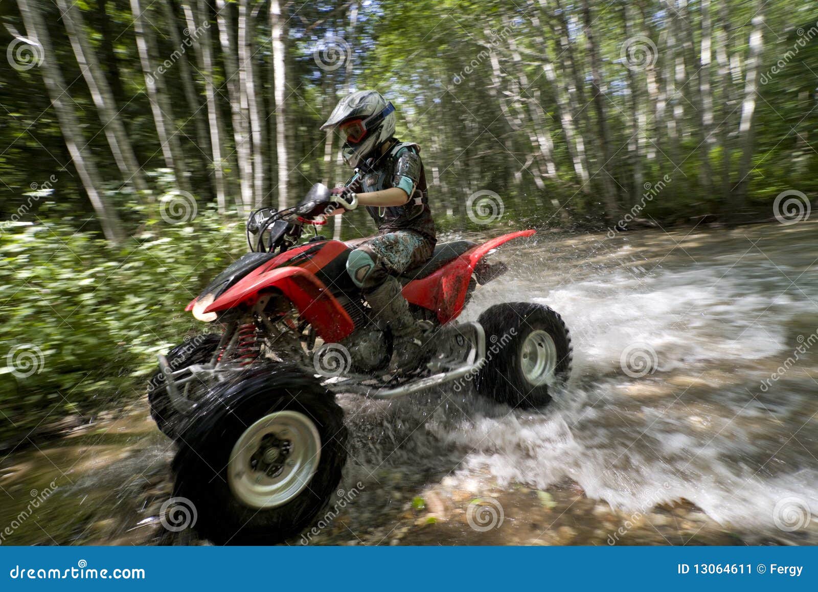 Female Riding ATV through Creek Stock Image Image of driving, quadbike 13064611