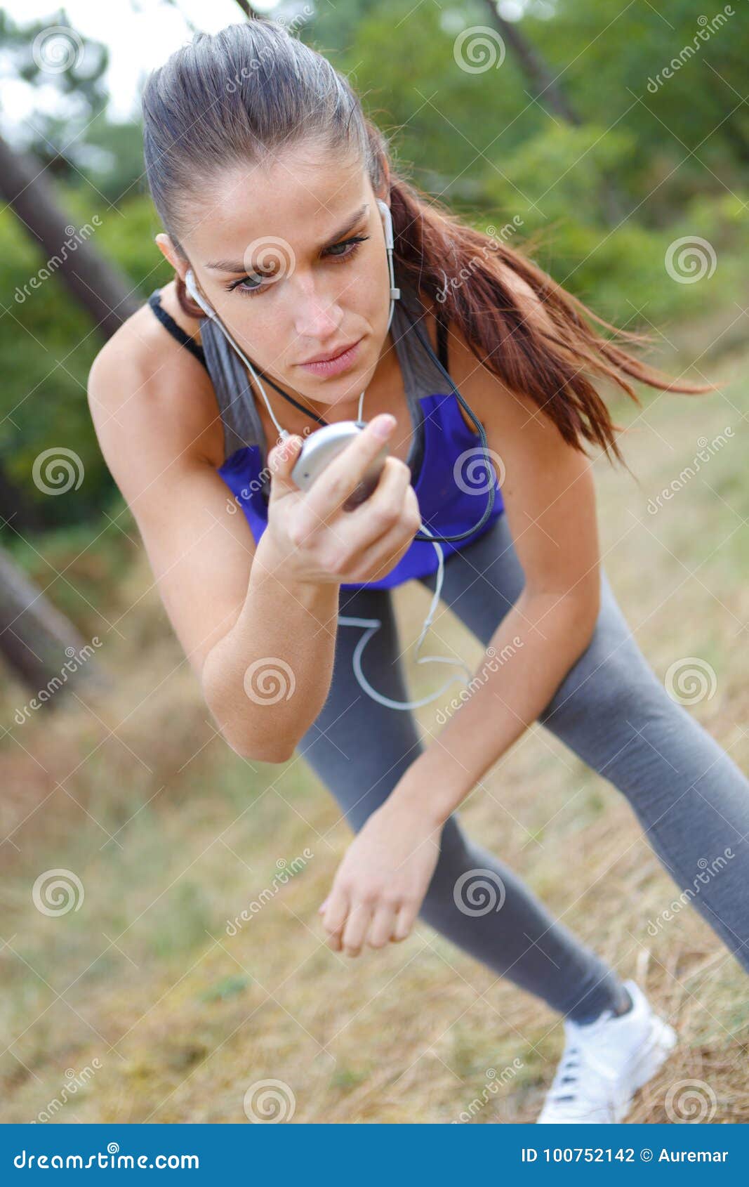 Female Runner Looking at Sport Watch Stock Photo - Image of female ...