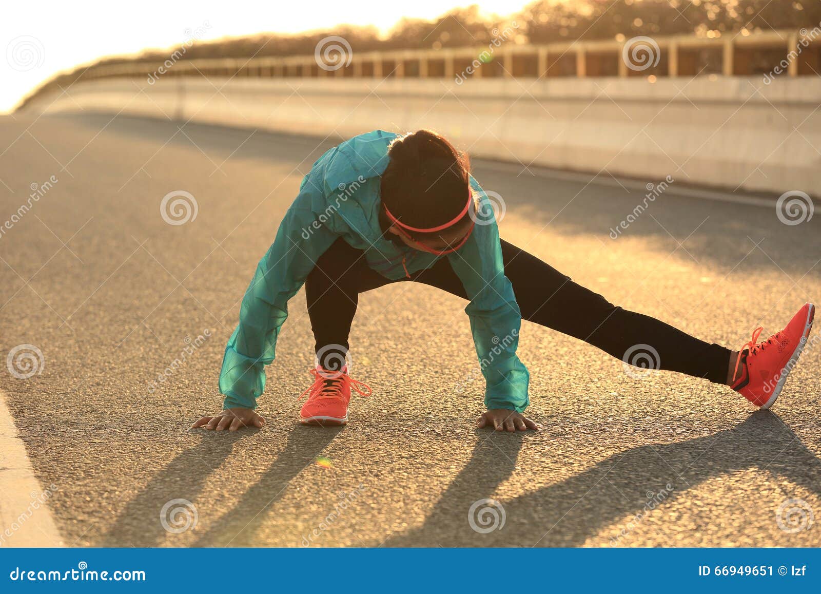 Female Runner Stretching Her Legs On Sunrise Road Stock Image Image