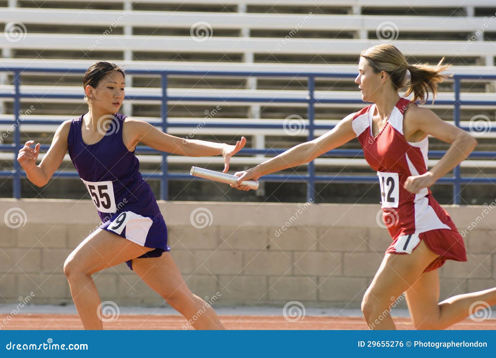 female runners in relay race