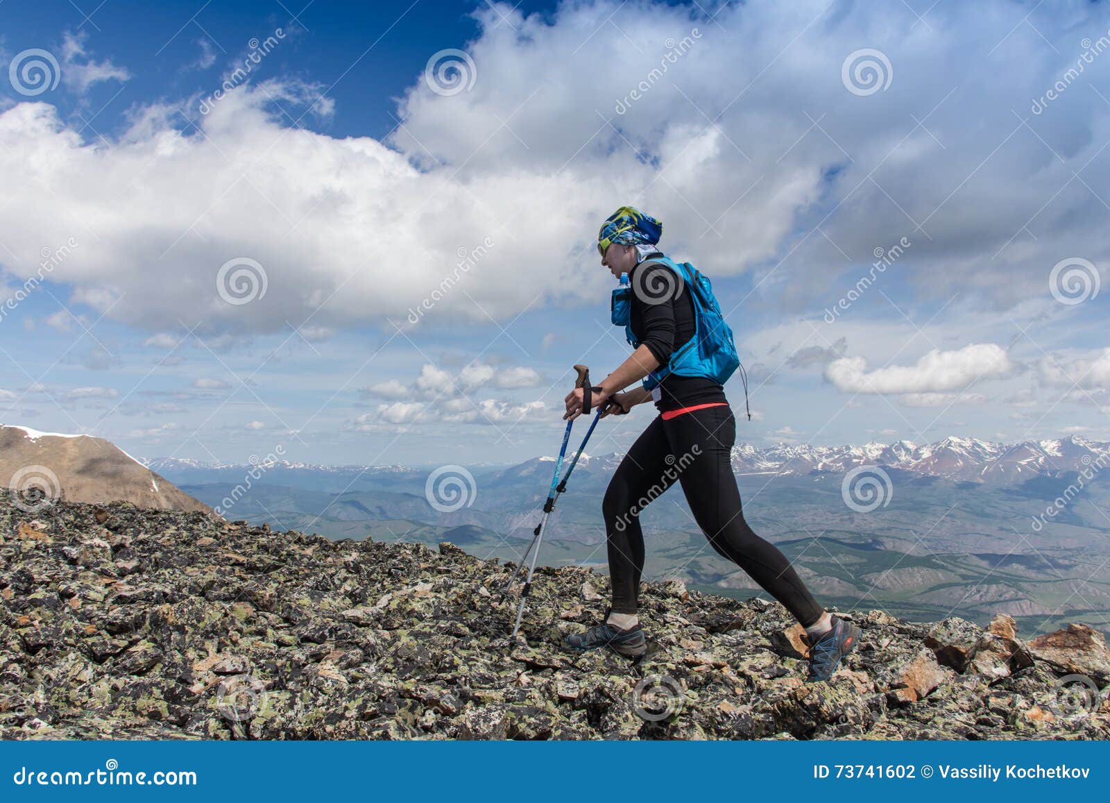 Female Running in Mountains Under Sunlight. Stock Photo Image of