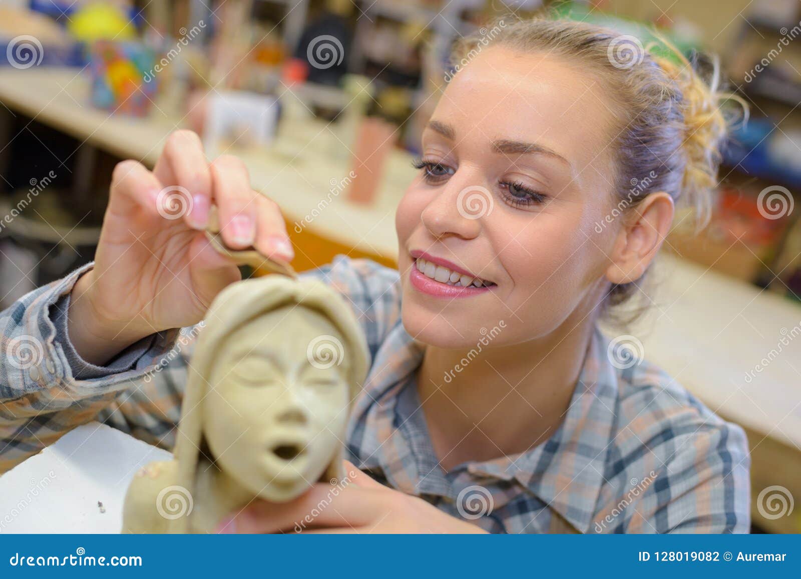 Female sculptor at work editorial photography. Image of open 128019082