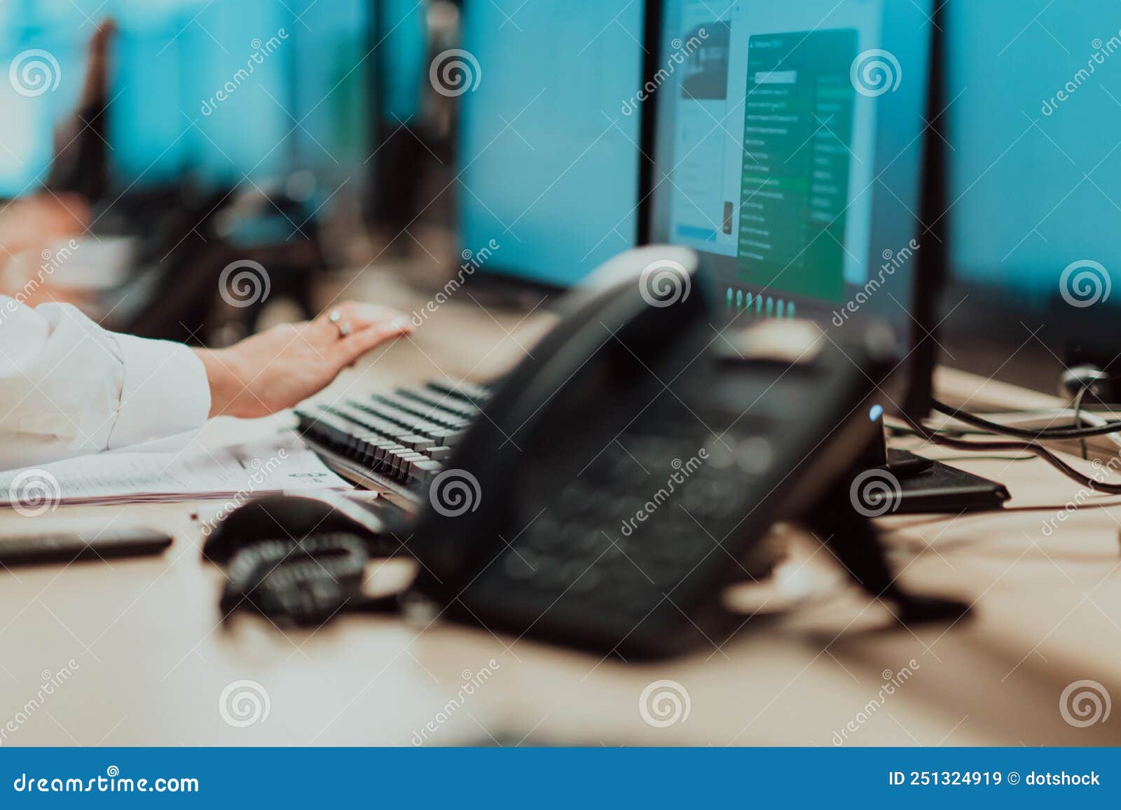 Female Security Operator Working in a Data System Control Room Offices