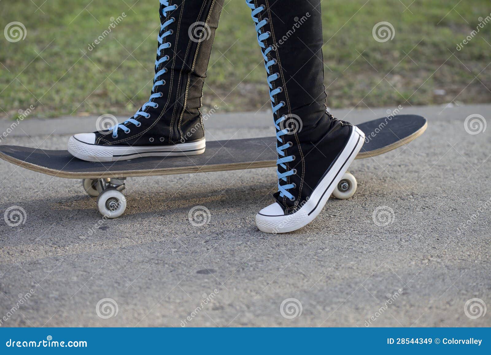 Female with Skateboard in High Knee Sneakers. Stock Image Image of