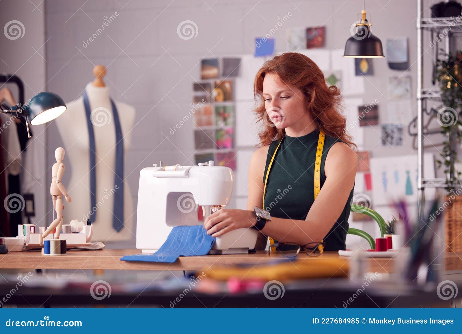 Female Student or Business Owner Working in Fashion Using Sewing