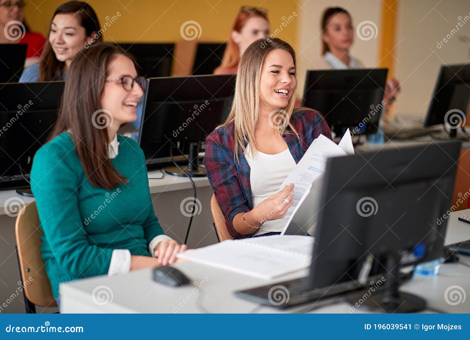 female students at an informatics lecture