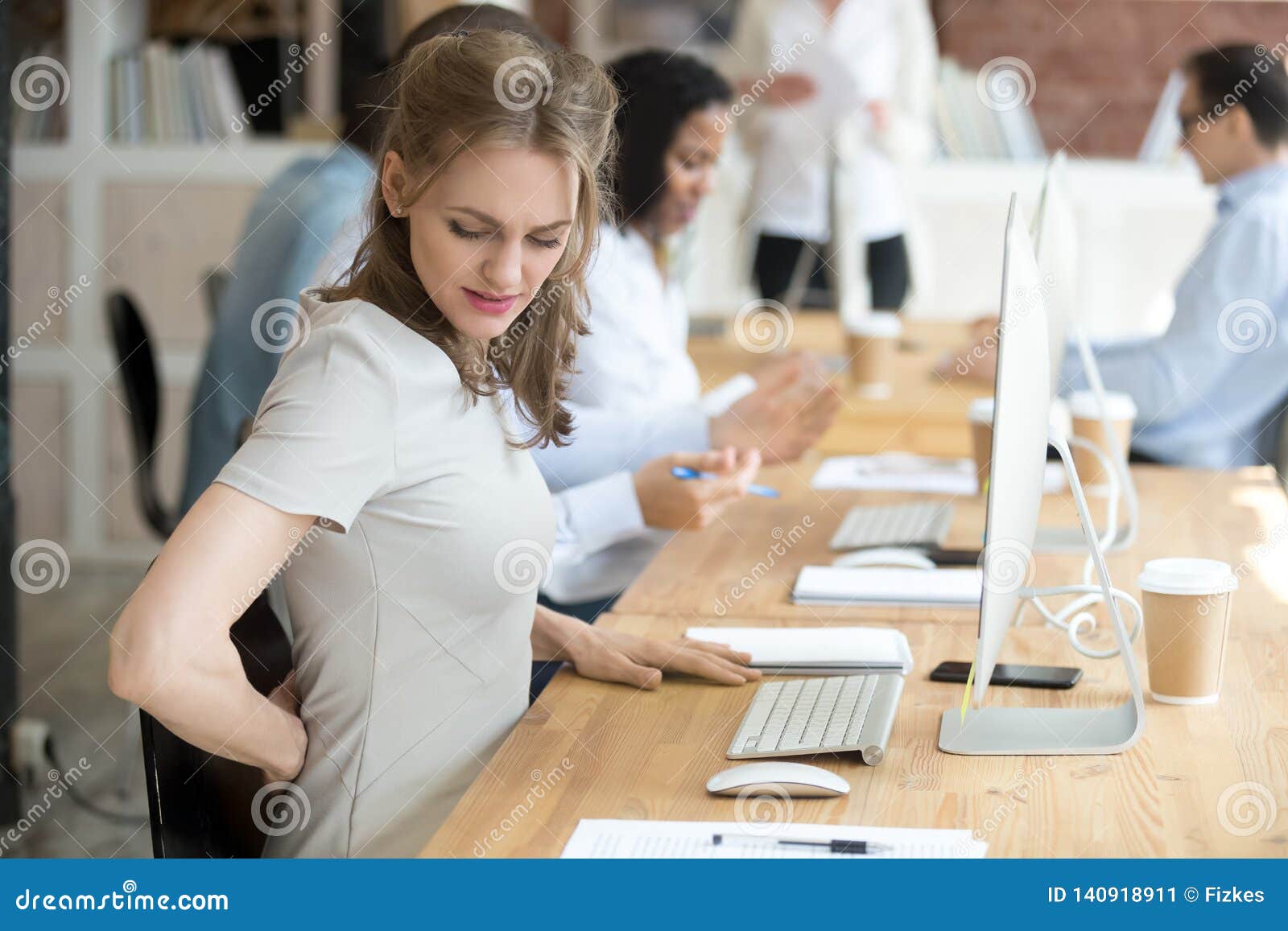 Female Suffering From Low Back Pain At Work Stock Image Image Of