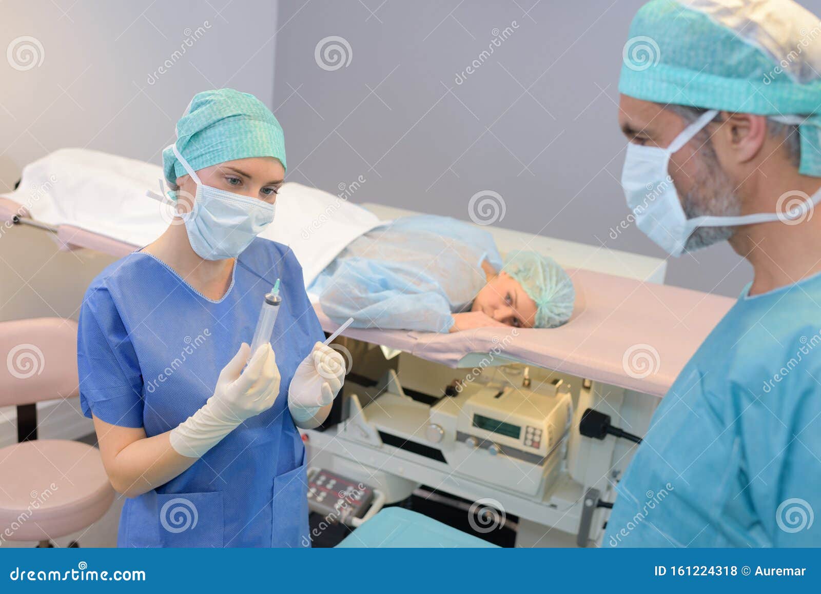 female surgeon anaesthetist at patient operating room