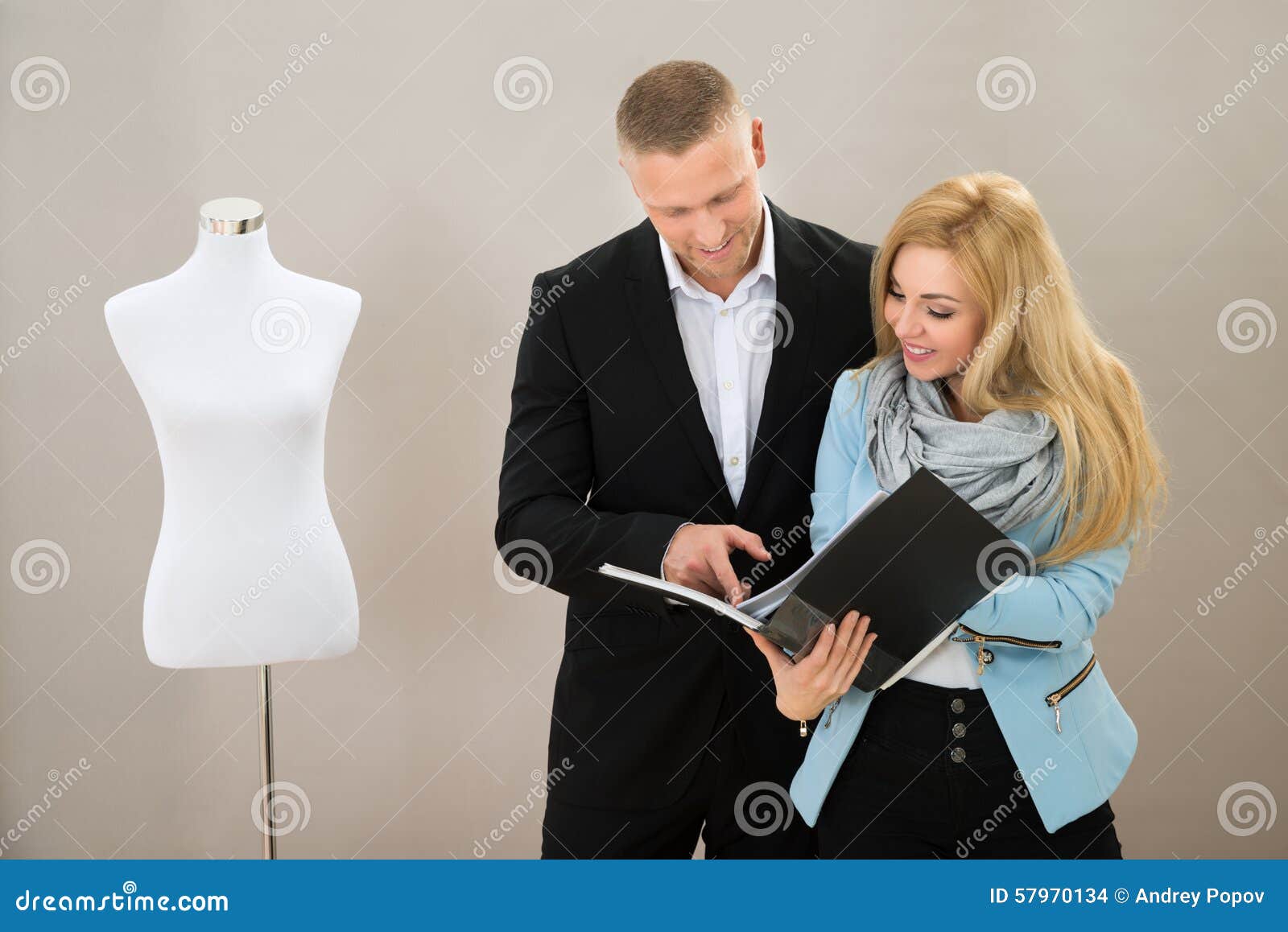 Female Tailor with Client Looking at Catalogue Stock Photo Image of