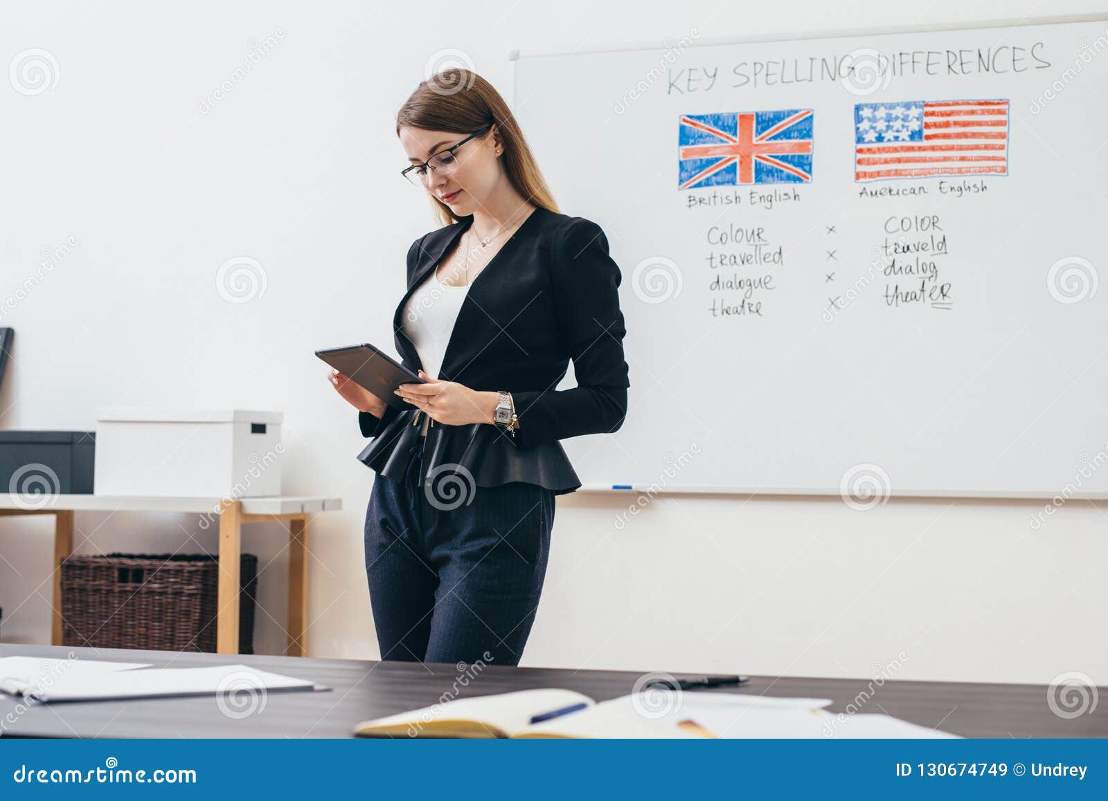 Female Teacher Looking at Camera. English Language School. Stock Image