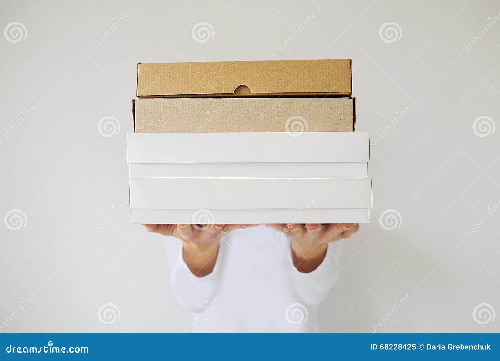 A Female Two Hands Hold the Empty Boxes. Stock Image - Image of carton